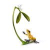 Frogman Misteltoe - front profile of bronze sculpture gold frog reaches tentatively for two ruby red ladybugs cling to a sprig of mistletoe.
