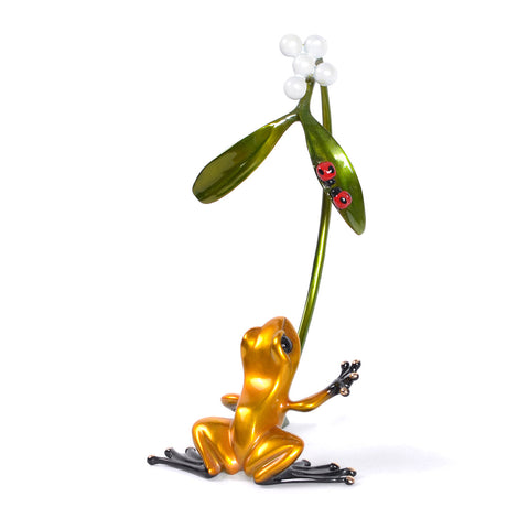 Frogman Misteltoe - back profile of bronze sculpture gold frog reaches tentatively for two ruby red ladybugs cling to a sprig of mistletoe.